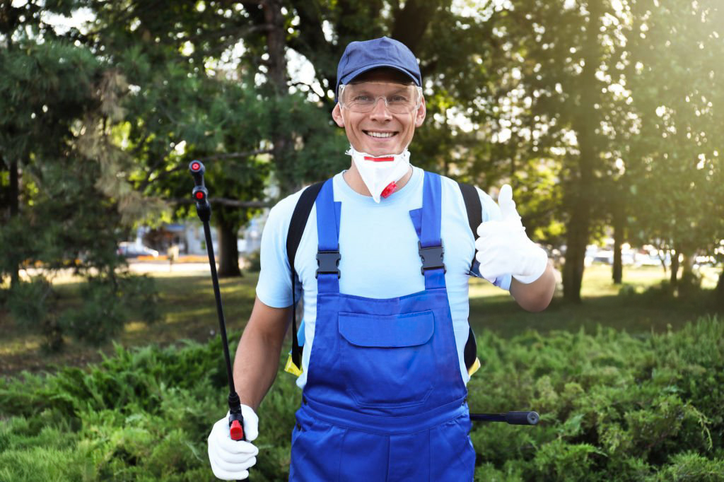 Licensed pest control technician inspecting a home